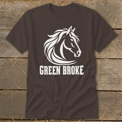 Dark brown short-sleeve t-shirt featuring a white graphic of a horse's head and the text "GREEN BROKE".