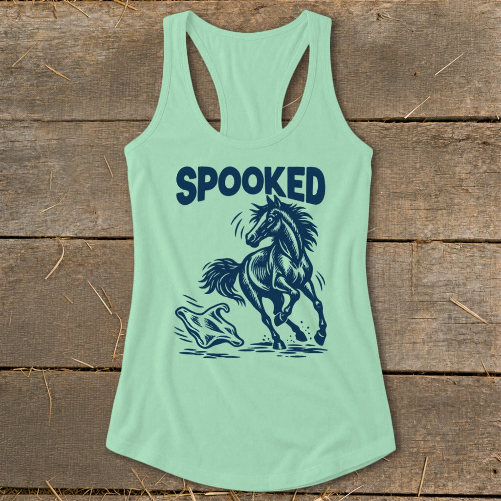 Mint green tank top with "SPOOKED" text and a running horse with a ghost graphic.