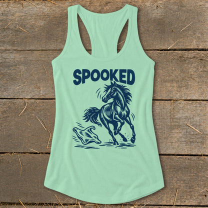 Mint green tank top with "SPOOKED" text and a running horse with a ghost graphic.