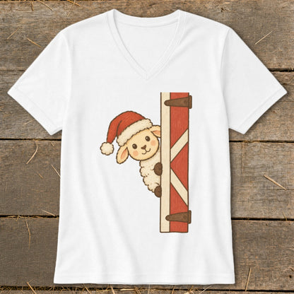 A cartoon sheep wearing a Santa hat peeks from behind a red barn door.