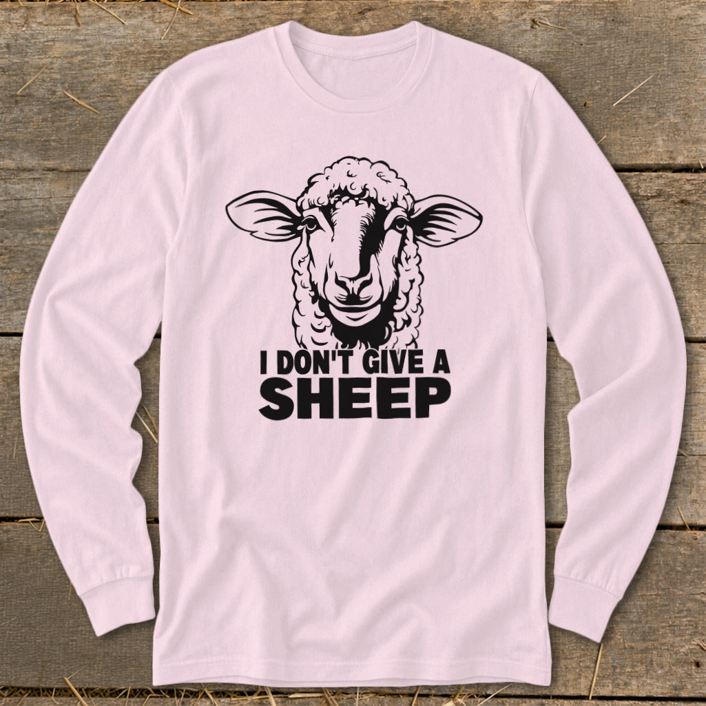 Pink long-sleeve shirt with a black graphic of a sheep's face and text.