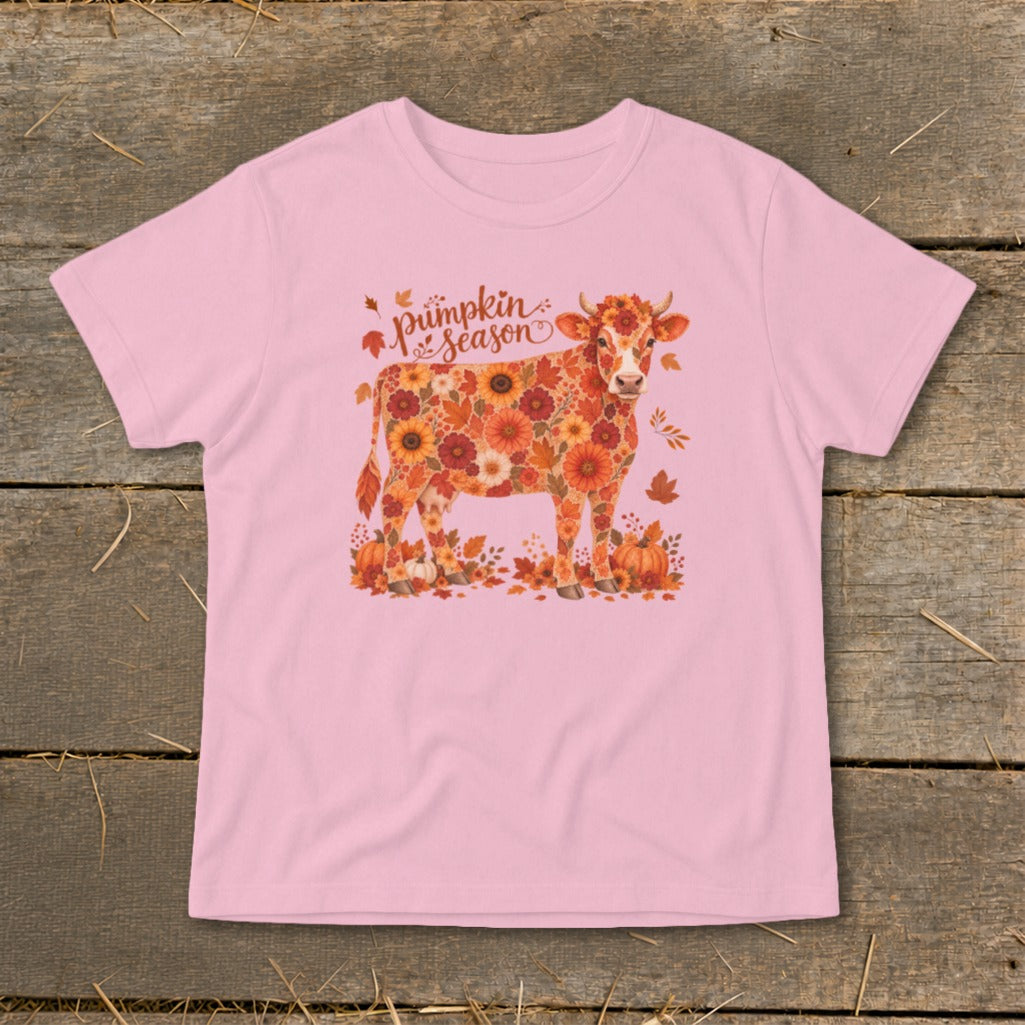 Pink t-shirt with a cow illustration made of autumn flowers and leaves.