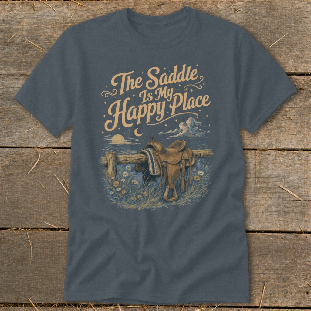 T-shirt graphic with saddle on fence and text "The Saddle Is My Happy Place".