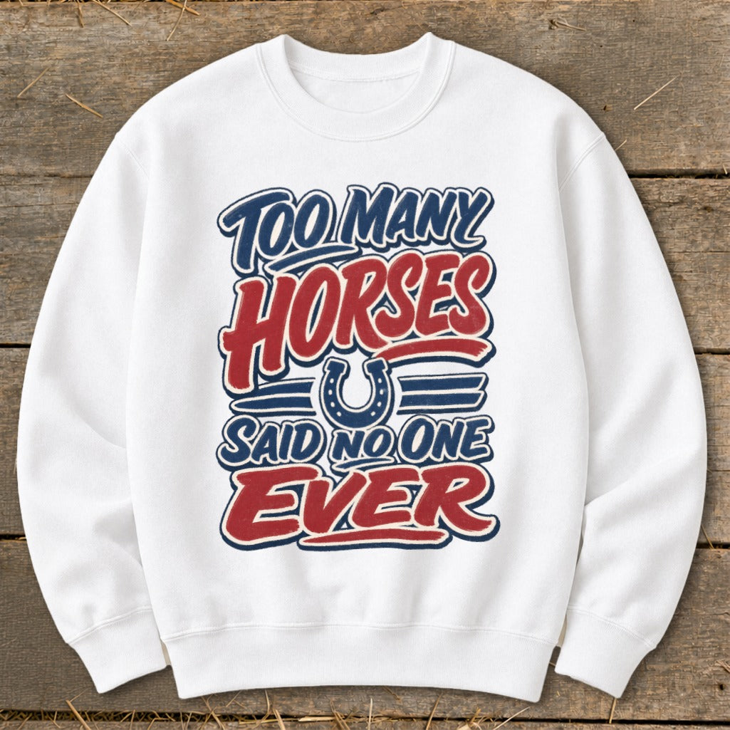 White sweatshirt with "Too Many Horses Said No One Ever" graphic and horseshoe.
