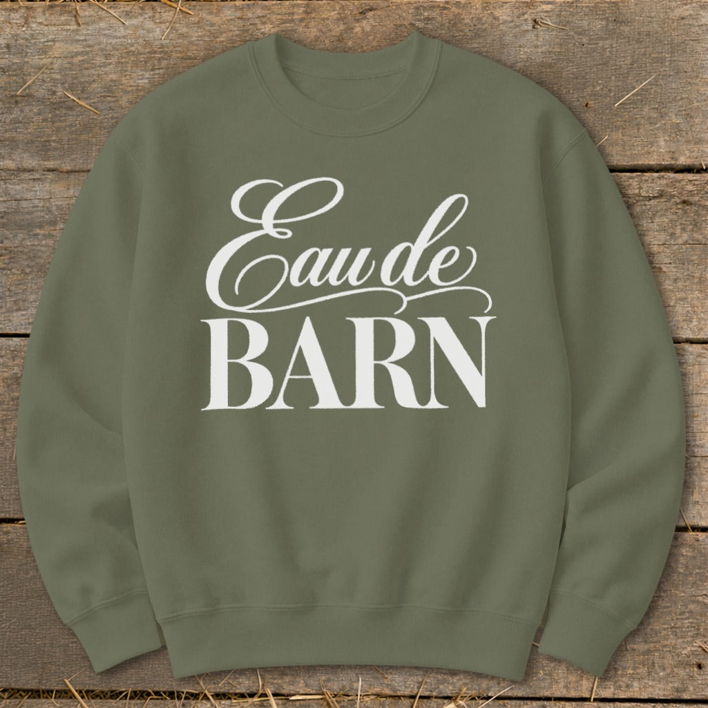 Olive green sweatshirt with white text "Eau de BARN"