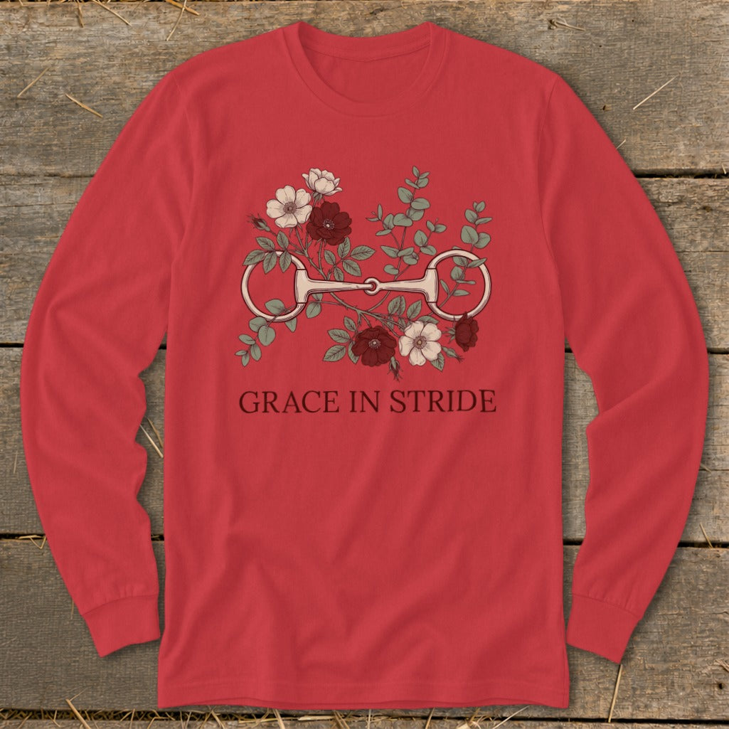 Red long-sleeve shirt with a horse bit and floral design, text reads "GRACE IN STRIDE".