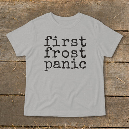 Light gray t-shirt with black text "first frost panic"