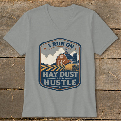 Grey t-shirt with a farm scene graphic and text that reads "I Run On Hay Dust And Hustle."