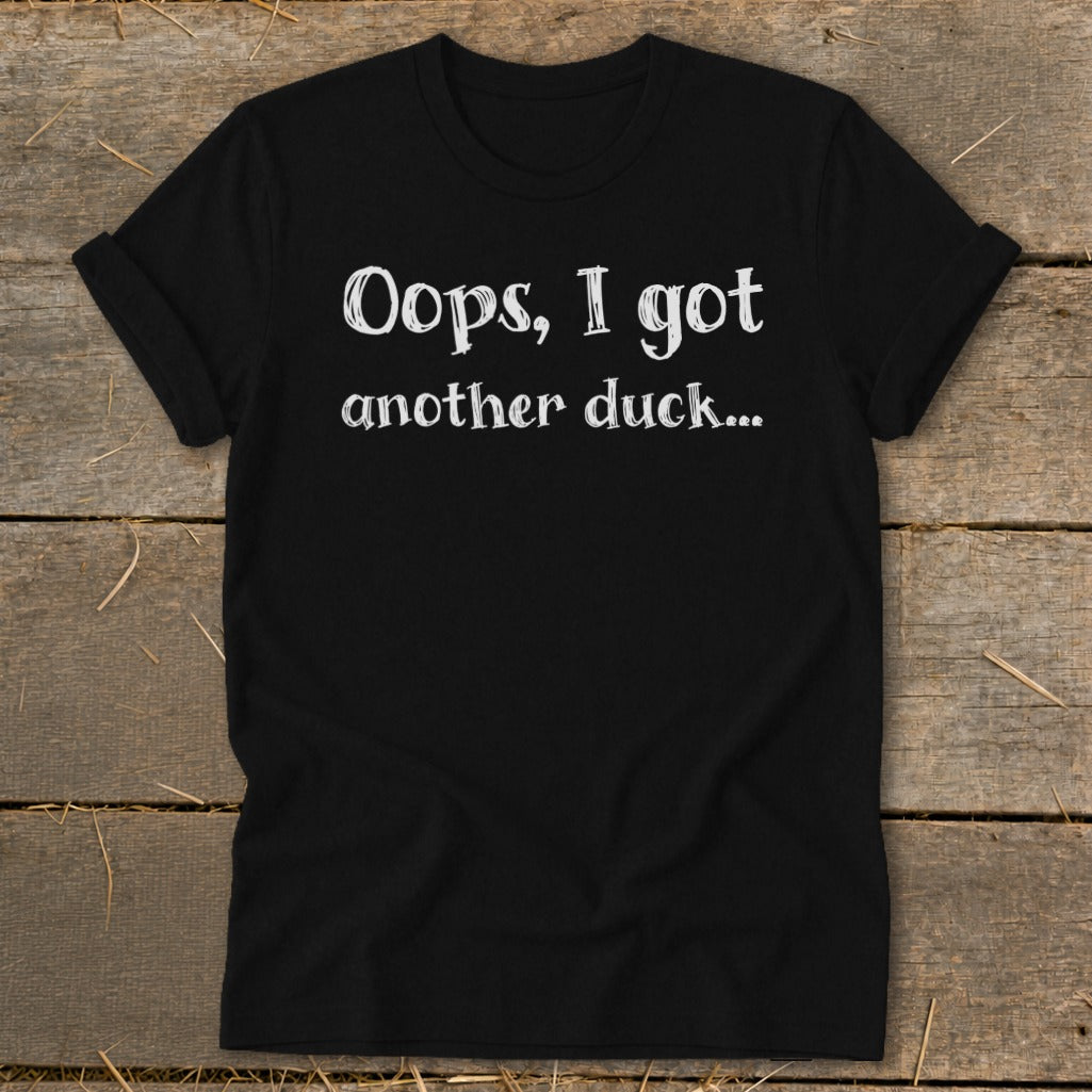 Black t-shirt with white text reading "Oops, I got another duck...".