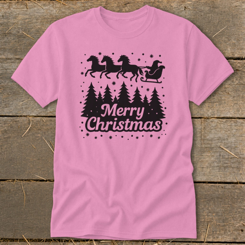 Pink t-shirt with black Christmas trees, Santa in a sleigh pulled by horses, and "Merry Christmas" text.