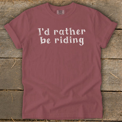 Maroon t-shirt with white text that reads "I'd rather be riding".