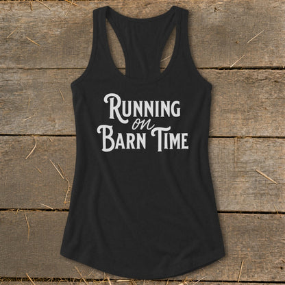 Black tank top with "Running on Barn Time" text in white cursive font.