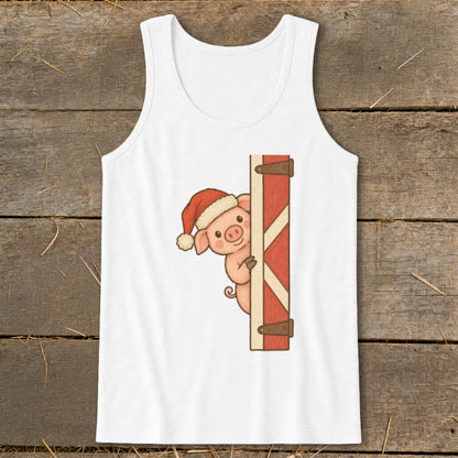 Cute pig in Santa hat peeking around a red barn door.