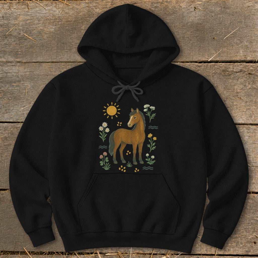 Black hoodie with a brown horse, sun, and floral illustration.