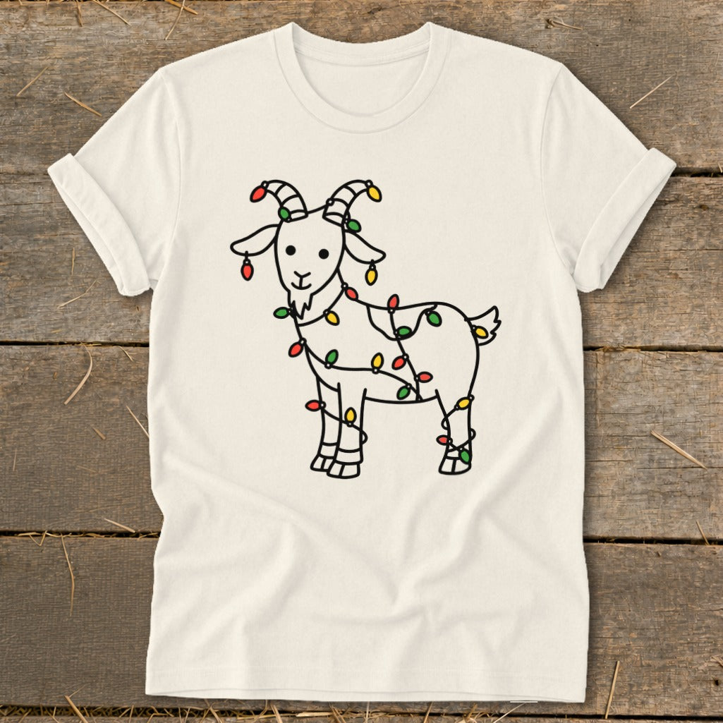 Cream t-shirt with black line drawing of a goat wrapped in colorful Christmas lights.