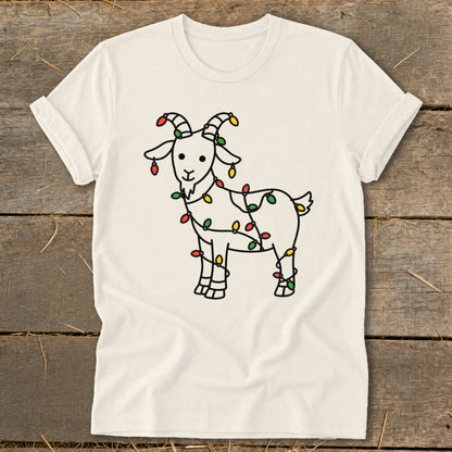 Cream t-shirt with black line drawing of a goat wrapped in colorful Christmas lights.