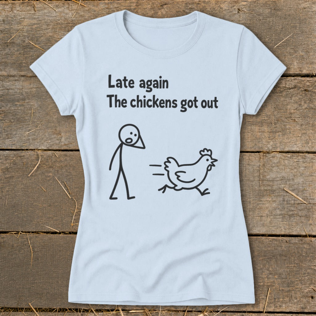 Light blue t-shirt with text "Late again The chickens got out" and stick figures.