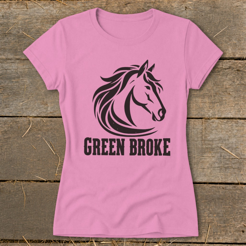 Pink women's t-shirt featuring a black horse head graphic and the text "GREEN BROKE".