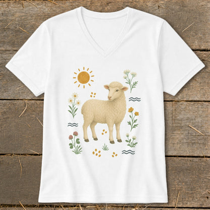 White v-neck shirt with a cream-colored sheep illustration surrounded by flowers, sun, and waves.