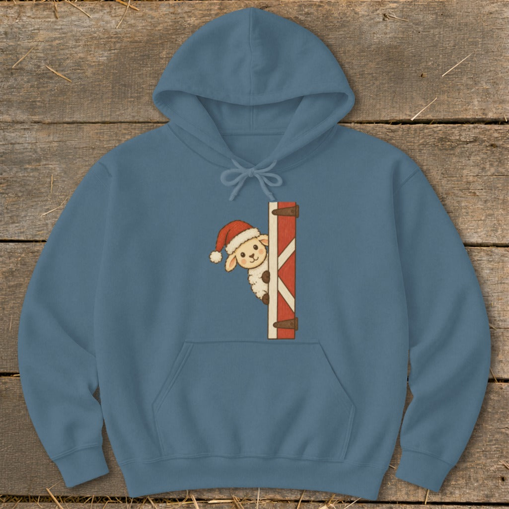 Blue hoodie with a cartoon sheep wearing a Santa hat peeking from behind a barn door.