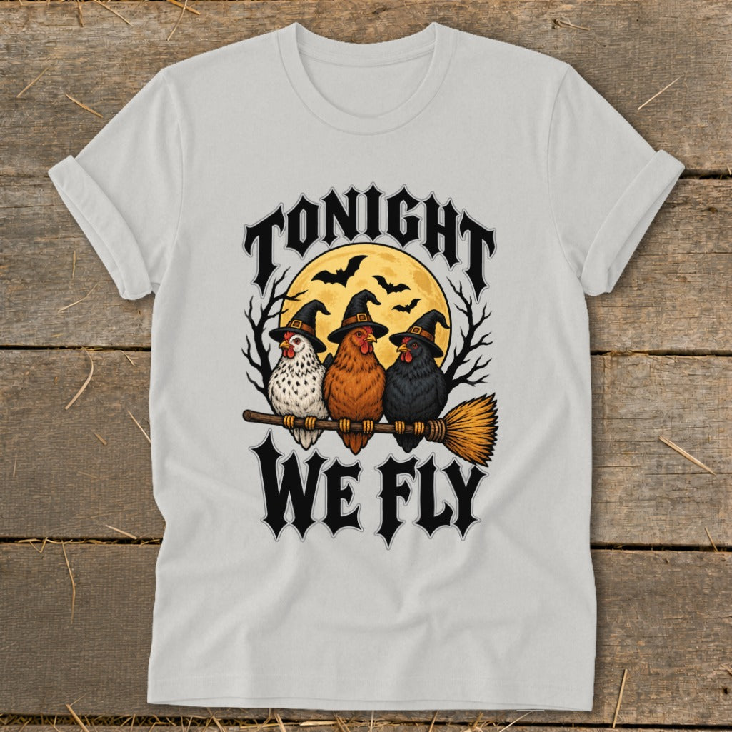Three witches' hats wearing chickens sit on a broomstick with text "Tonight We Fly."