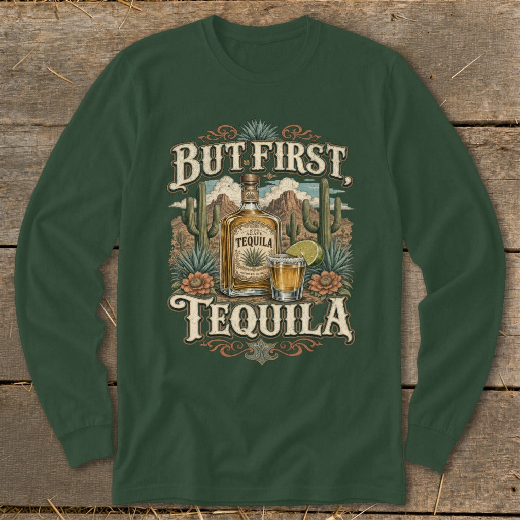 But First, Tequila graphic with desert landscape, bottle, shot glass, and lime.