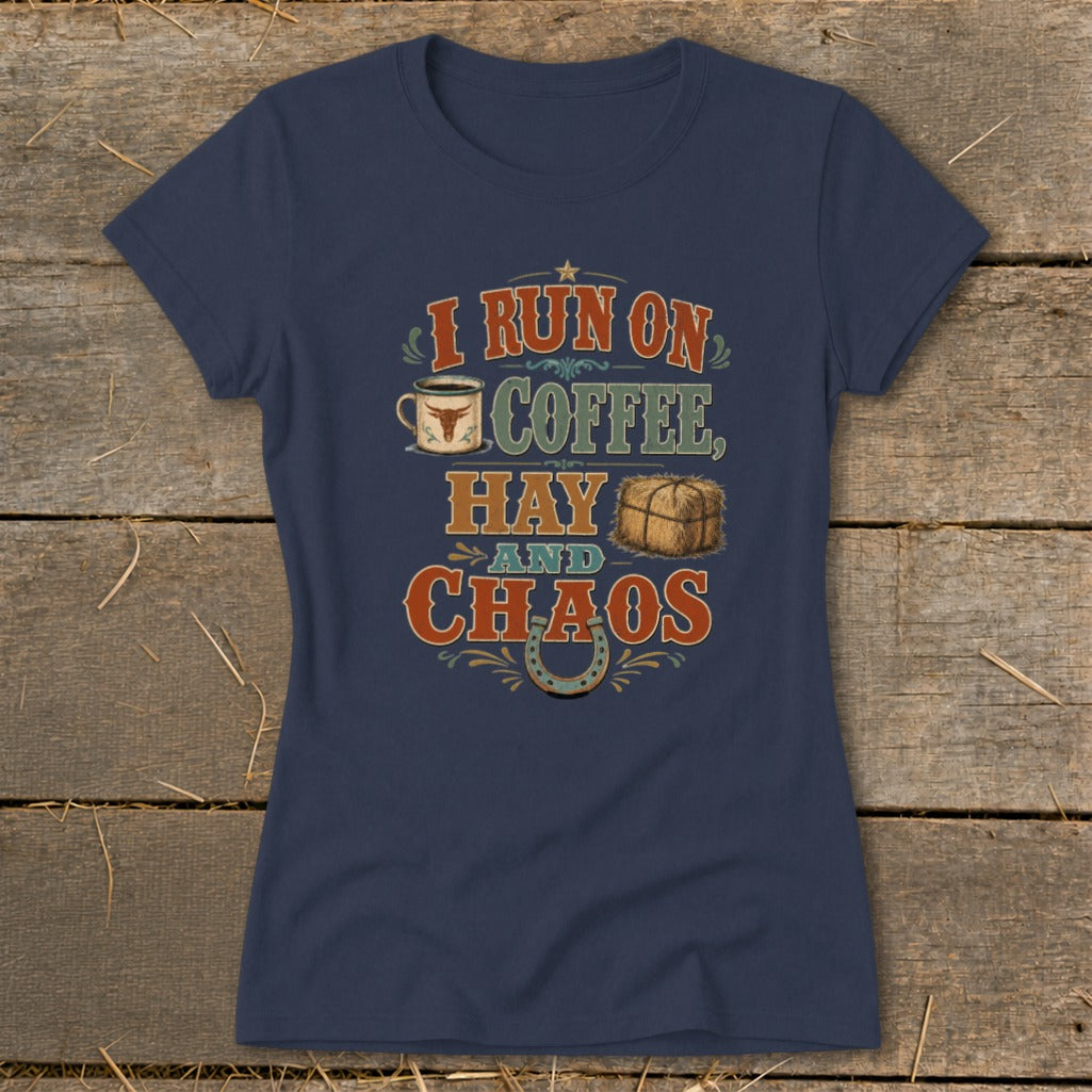 Navy t-shirt with "I run on coffee, hay and chaos" text, coffee cup, hay bale, and horseshoe graphic.