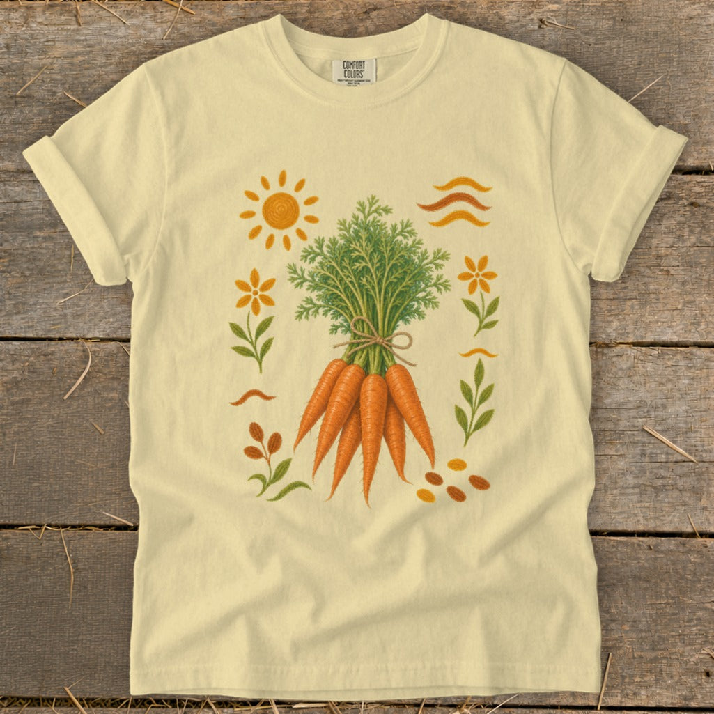 Light yellow t-shirt featuring a bouquet of carrots with surrounding sun, flowers, and wavy lines.