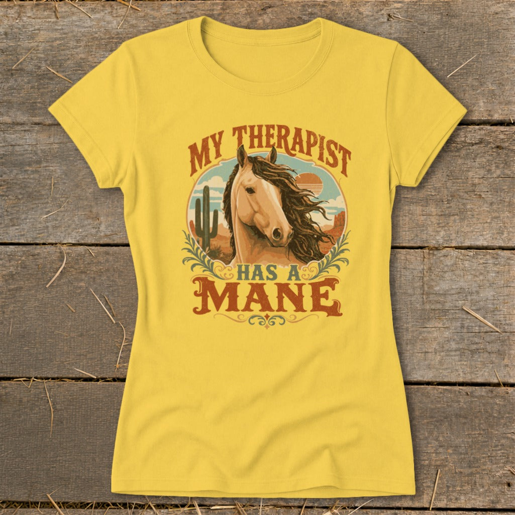 Yellow t-shirt with a horse graphic and text "MY THERAPIST HAS A MANE".