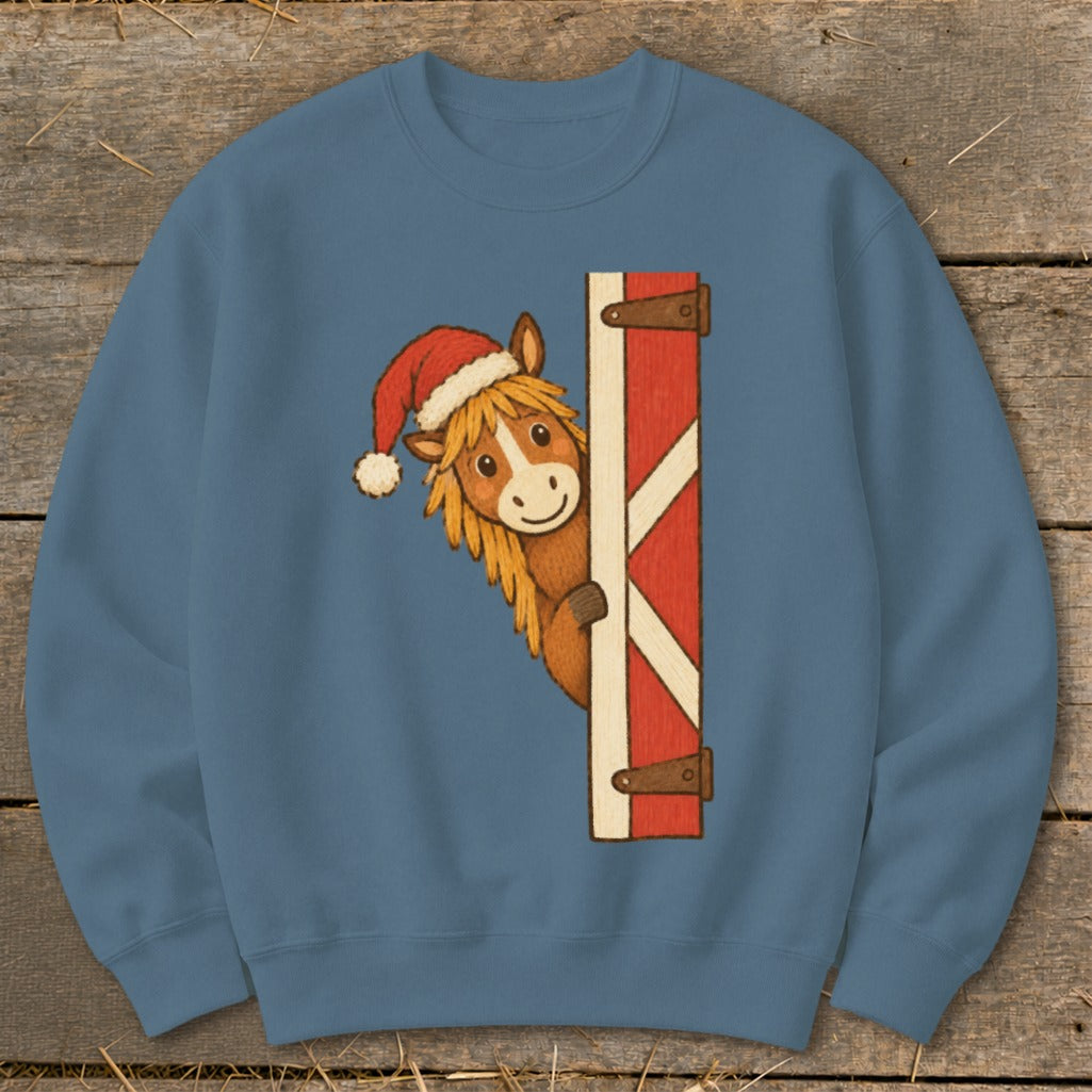 Cartoon horse wearing Santa hat peeking from behind a red barn door.