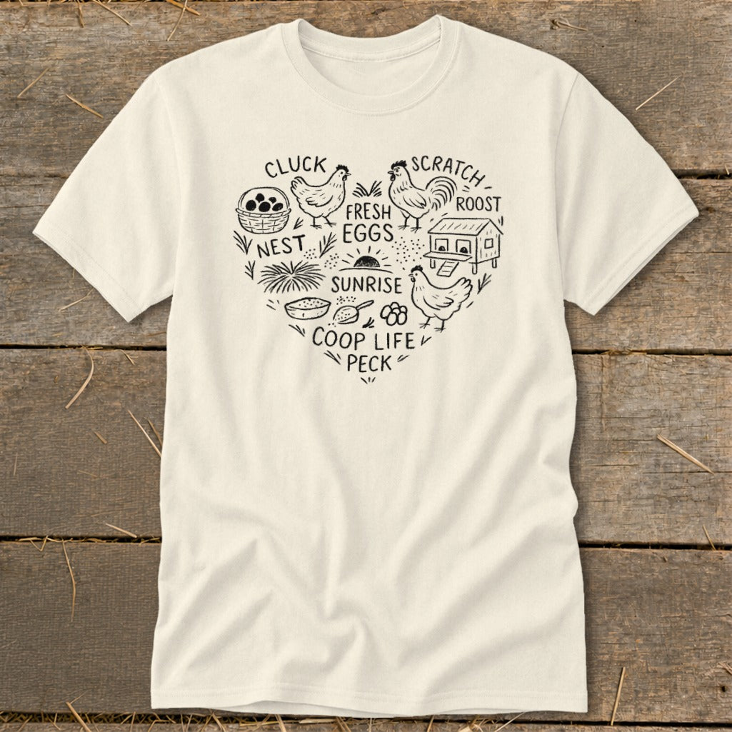 Cream t-shirt with heart-shaped chicken coop graphics and farm-related text.