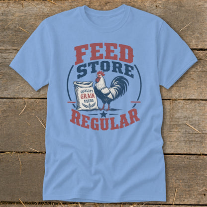 Light blue t-shirt with "Feed Store Regular" graphic and a rooster.
