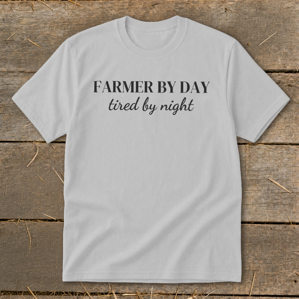 Light gray t-shirt with black text "FARMER BY DAY tired by night".