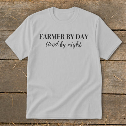 Light gray t-shirt with black text "FARMER BY DAY tired by night".