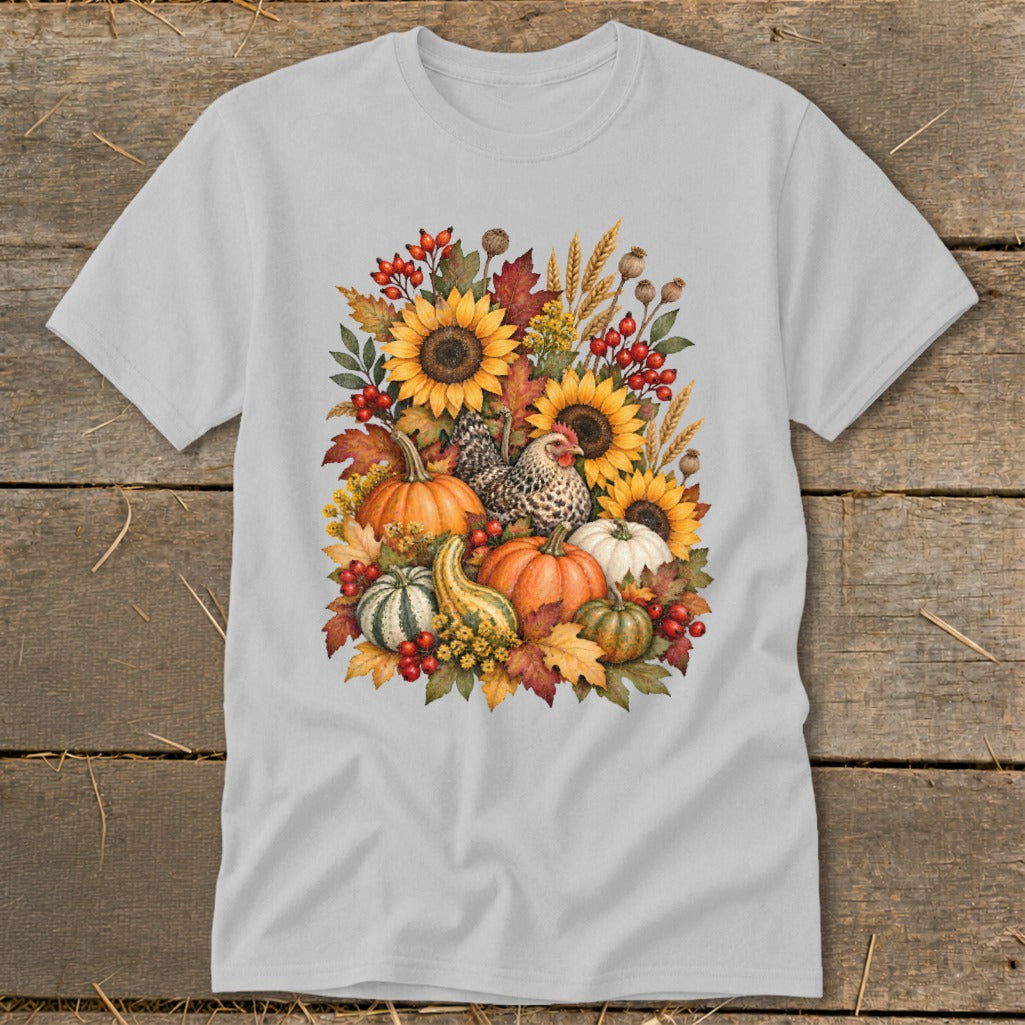 Light gray t-shirt with a colorful autumnal harvest graphic featuring sunflowers, pumpkins, and a chicken.