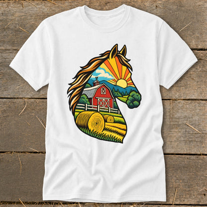 A white t-shirt featuring a colorful illustration of a horse silhouette filled with a farm landscape.