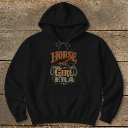 Black hoodie with "Horse Girl Era" graphic featuring a horse and horseshoe.