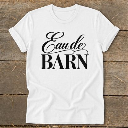 White t-shirt with "Eau de BARN" text in black script font.