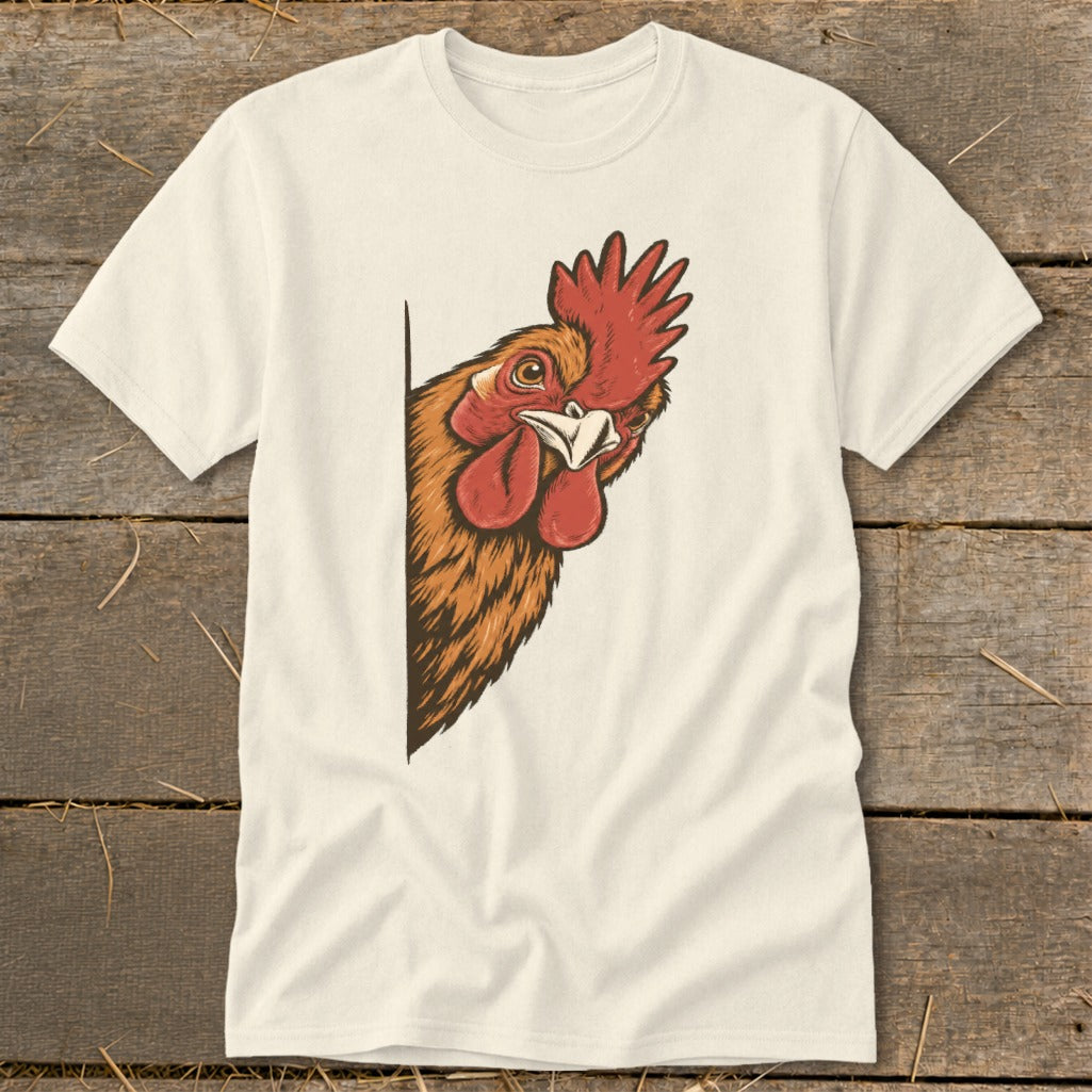 Illustration of a rooster peeking from the side of a light-colored t-shirt.