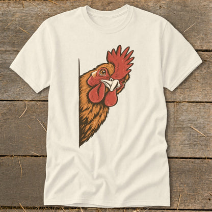 Illustration of a rooster peeking from the side of a light-colored t-shirt.