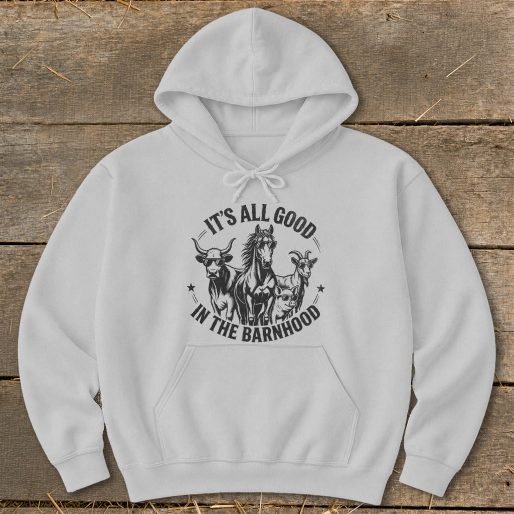White hoodie with "IT'S ALL GOOD IN THE BARNHOOD" text and farm animal graphics.