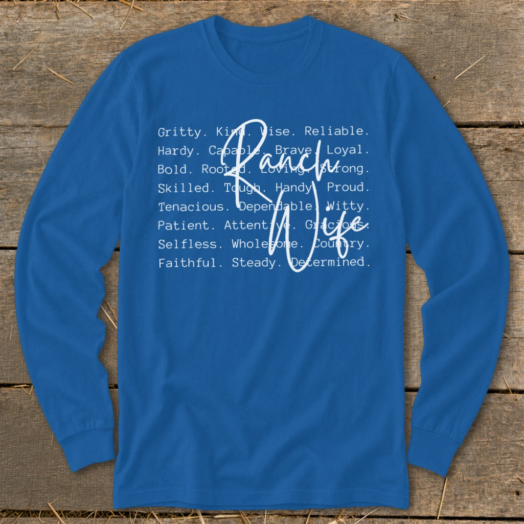 Blue long-sleeve shirt with "Ranch Wife" and descriptive words in white text.
