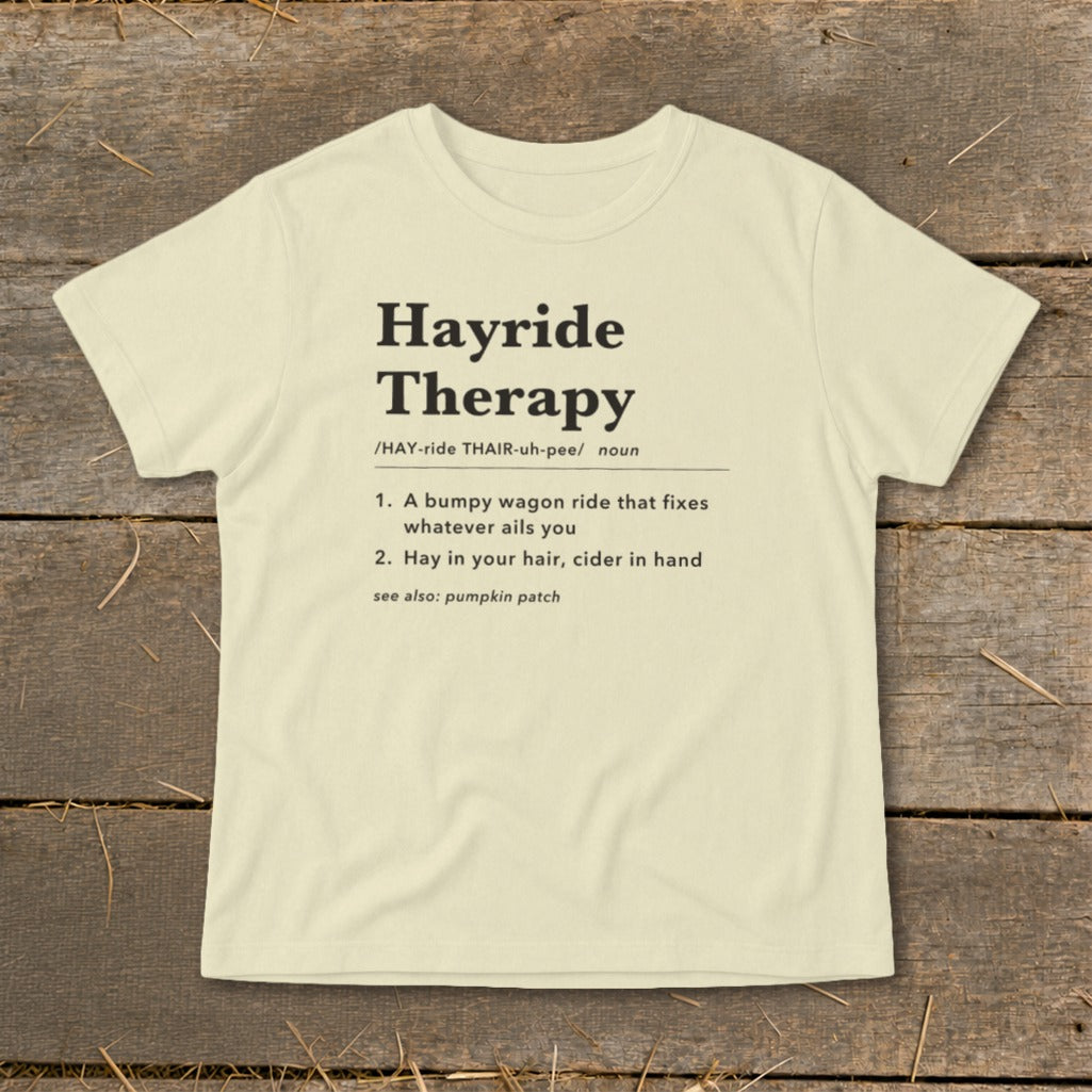 Cream t-shirt with "Hayride Therapy" definition print.