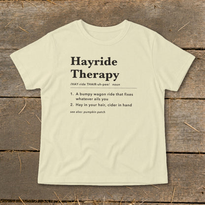 Cream t-shirt with "Hayride Therapy" definition print.