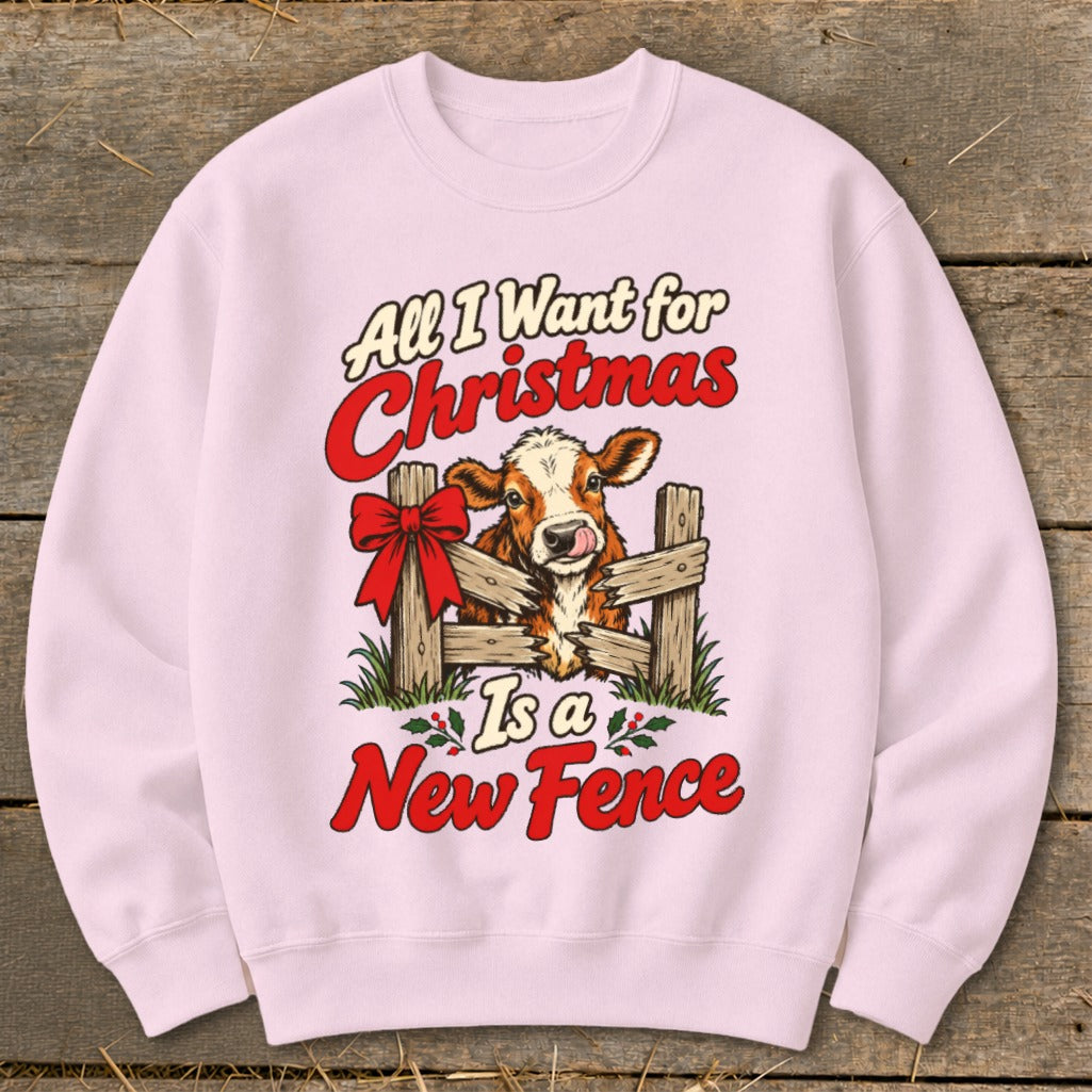 Pink sweatshirt with cow graphic and text: "All I Want for Christmas Is a New Fence".