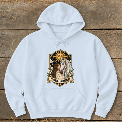 Light blue hoodie with a graphic of a woman and horse under a sun, reading "SOUL BOUND".
