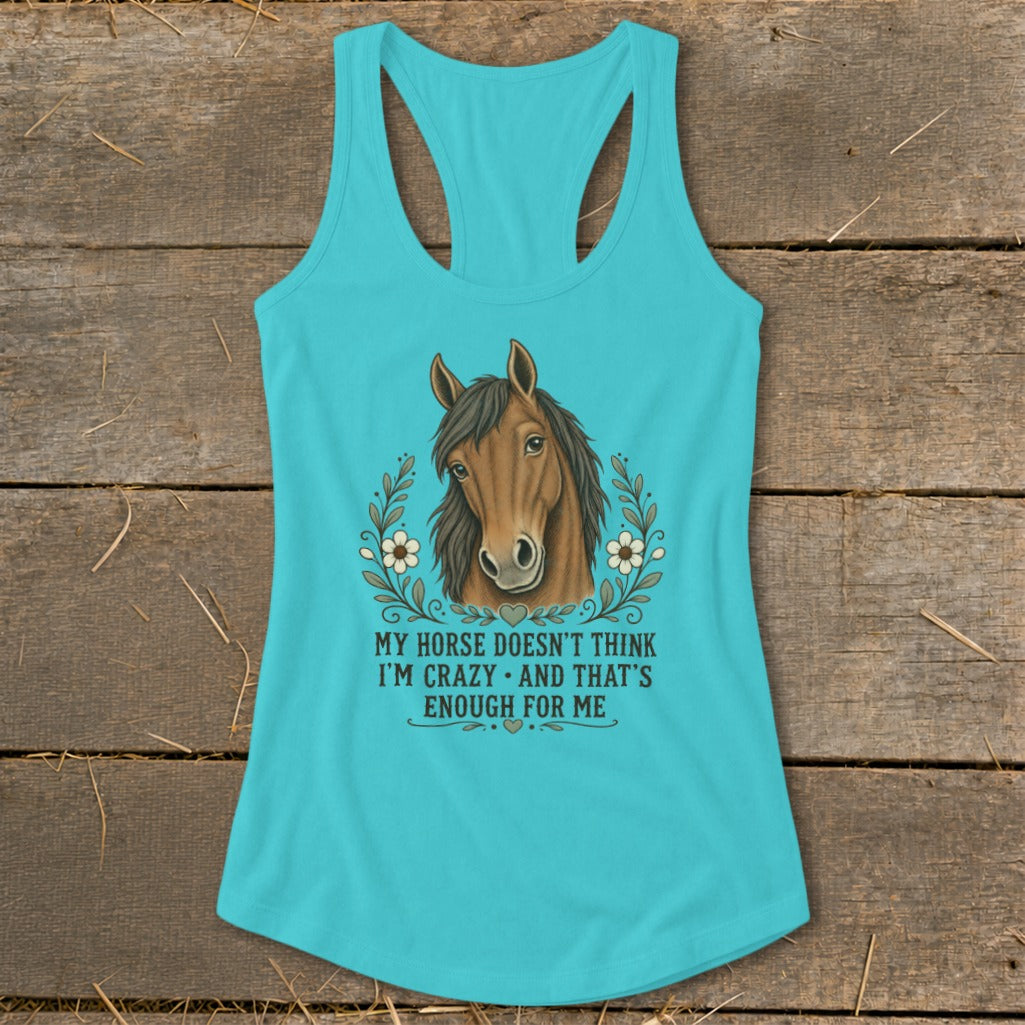 Turquoise tank top with horse illustration and text "My horse doesn't think I'm crazy."