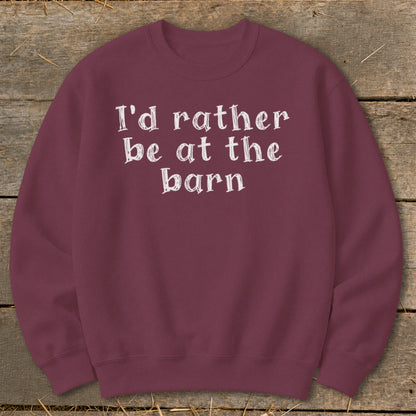 Maroon sweatshirt with white text "I'd rather be at the barn".