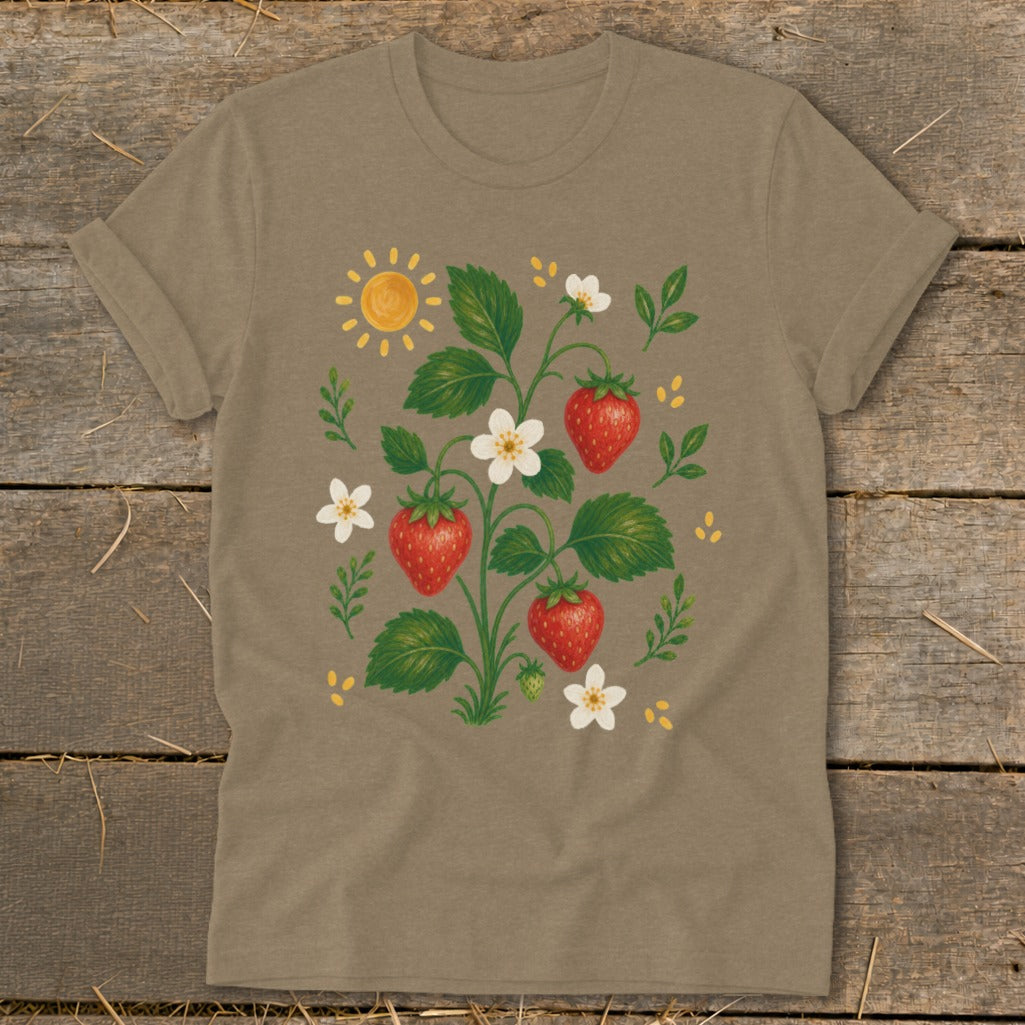 T-shirt with illustration of a strawberry plant, flowers, sun, and yellow dots.