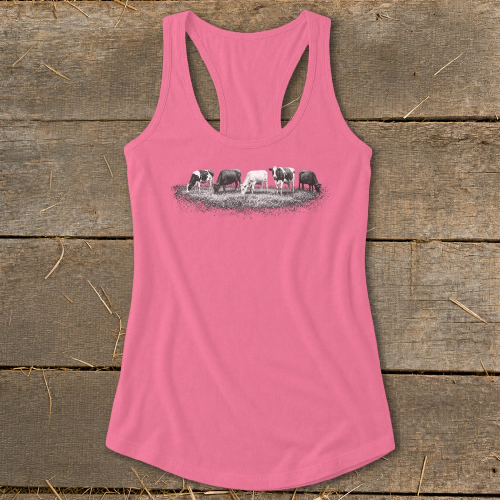 Pink tank top with a graphic of five cows grazing in a field.
